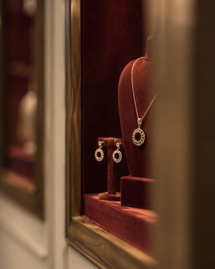 Earrings and a necklace in the Imania window display